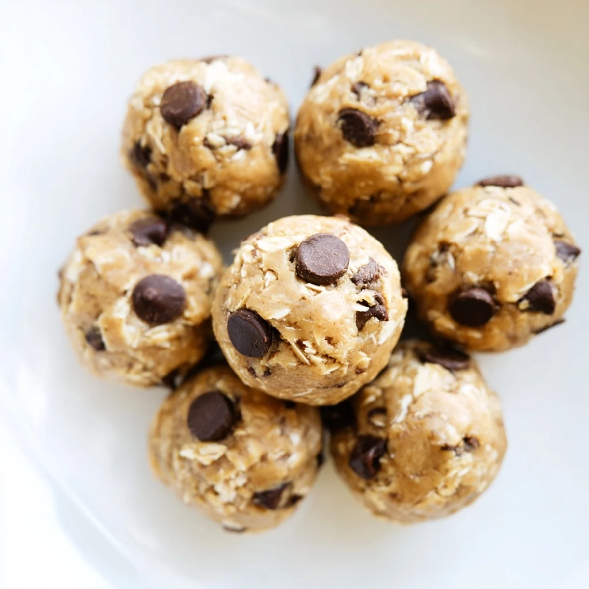 Plate of protein-packed cookie dough energy bites perfect for on-the-go nutrition