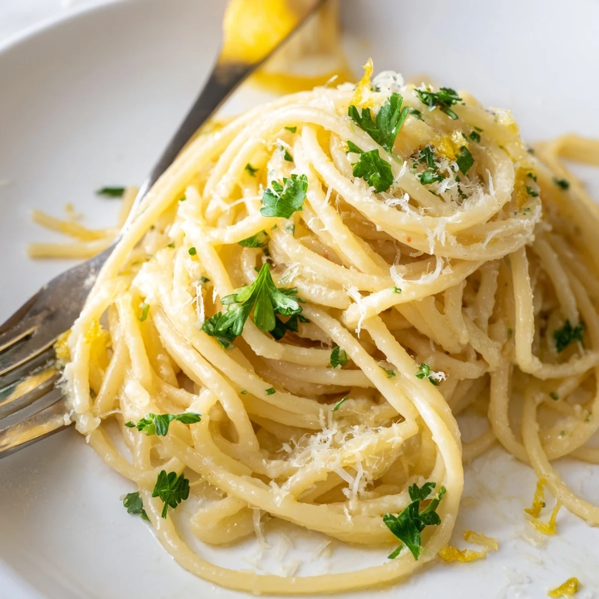 Close up of savory One Pot Garlic Butter Pasta tossed with aromatic minced garlic and herbs