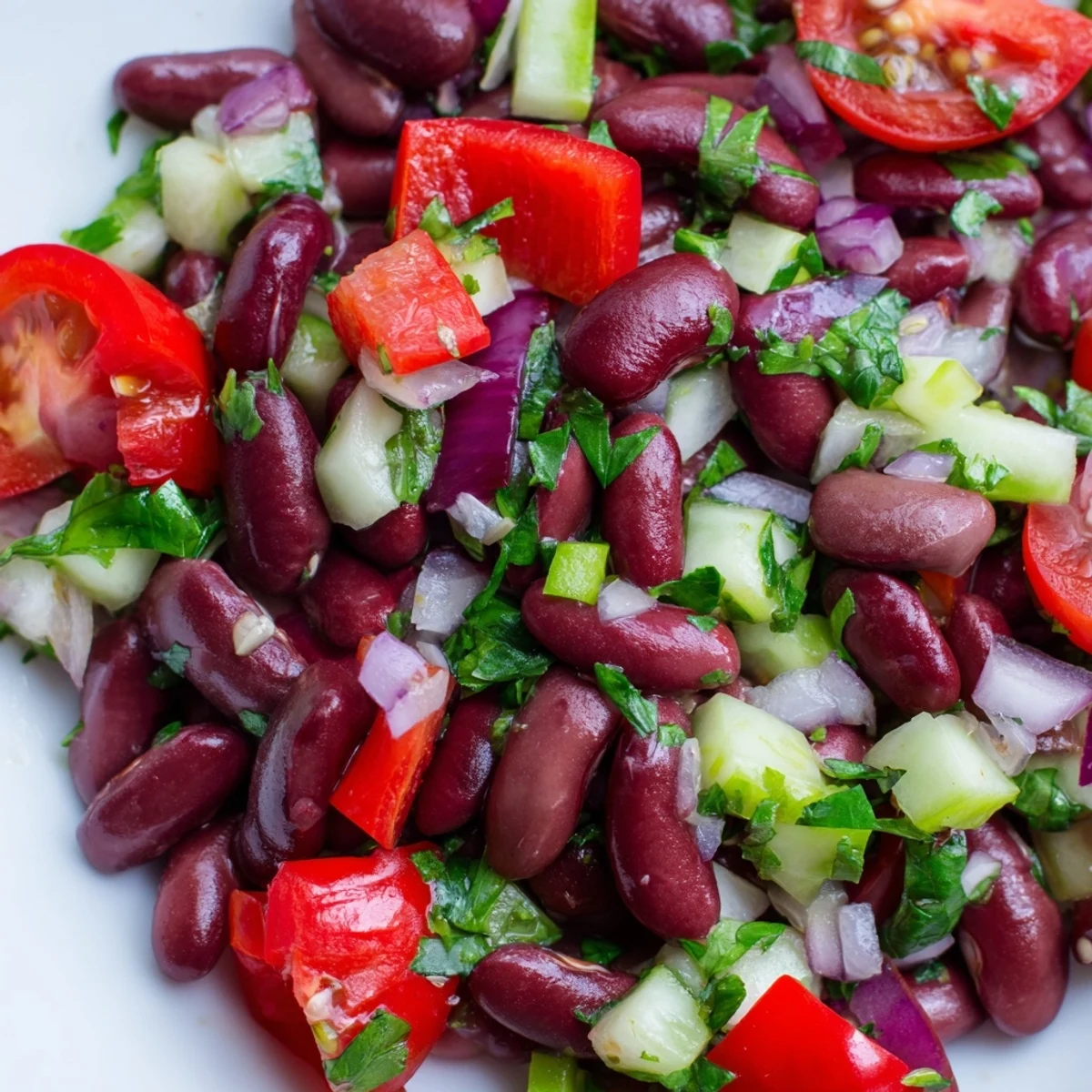 Colorful kidney bean salad in a rustic bowl with crisp bell peppers and fresh parsley