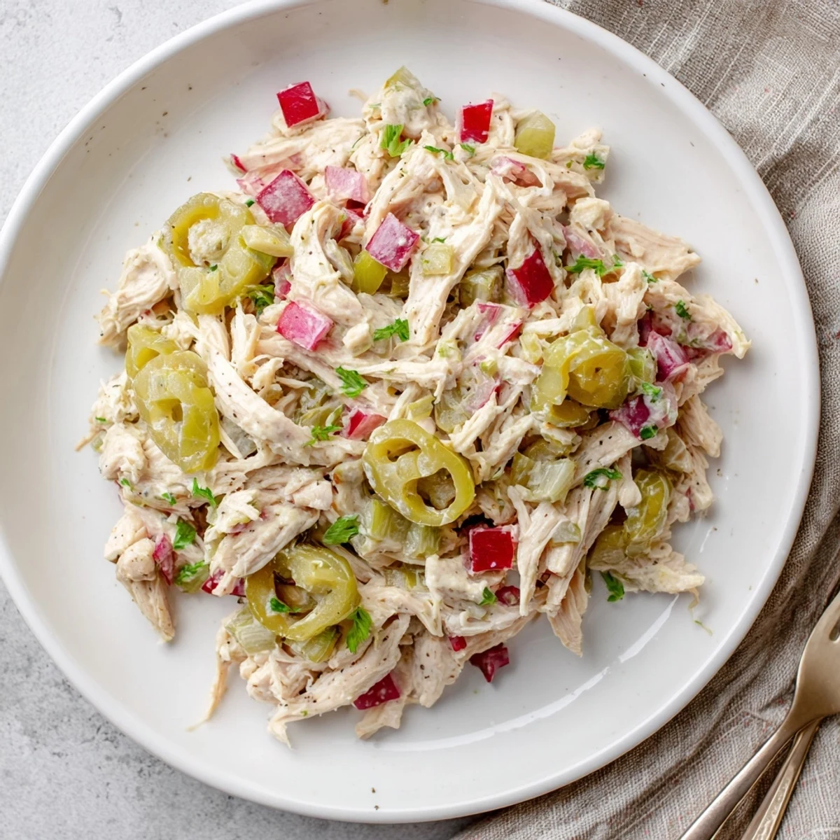 High Protein Pepperoncini Chicken Salad with crunchy celery, tangy dressing, served chilled