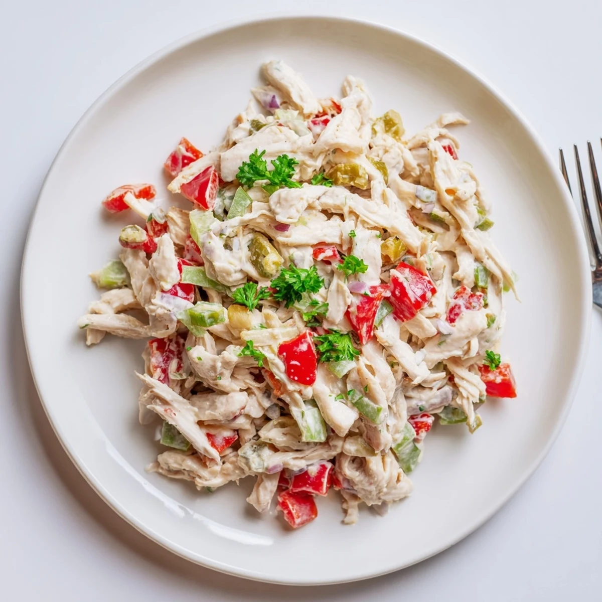 Homemade High Protein Pepperoncini Chicken Salad spooned into wraps for quick lunches