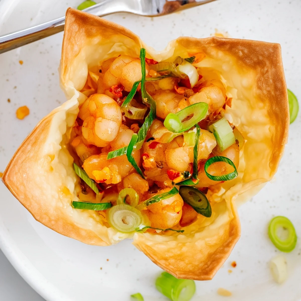 Warm Crispy Shrimp Wonton Cups With Lime Cream served on wooden board